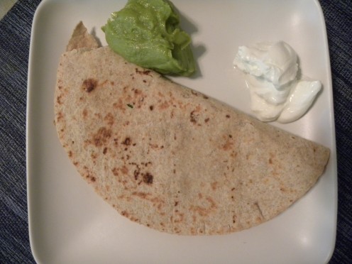Black bean and roasted corn quesadilla with guacamole and sour cream 