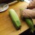 Cut the ends off your cobs of corn. Cut the ends off your cobs of corn.