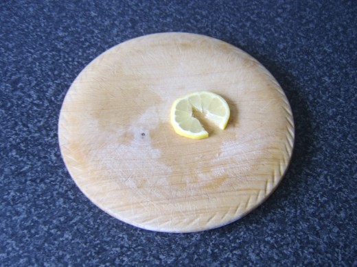 Lemon slice is cut for twisting