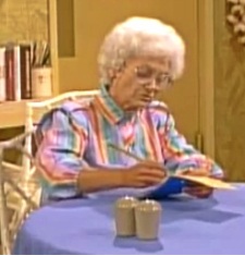 Sophia Petrillo makes calculations for a doomed potato, lettuce and bacon sandwich business. She has poor business acumen.