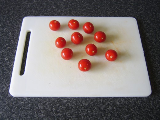 Cut is made in tomatoes to prevent messy bursting