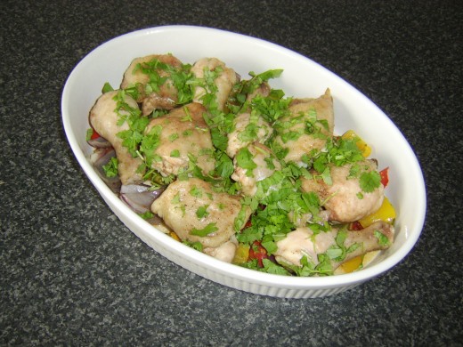 Coriander/cilantro is scattered over the chicken