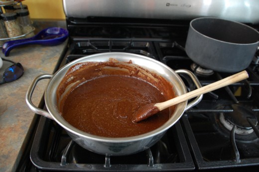 Remove chocolate from heat, cool slightly then add dry ingredients