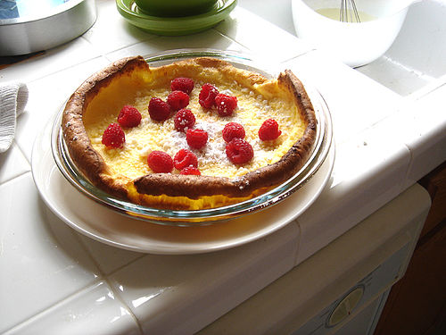 Topped with raspberries.