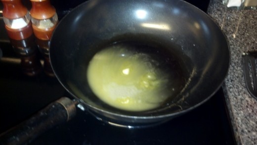 Heat up the oil, butter, and lemon juice on medium heat in a frying pan or wok.