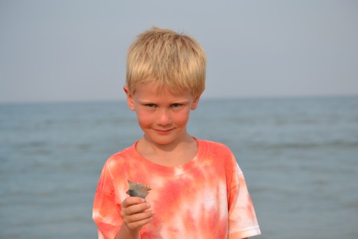 My son showing me one of his entries into the best shell category