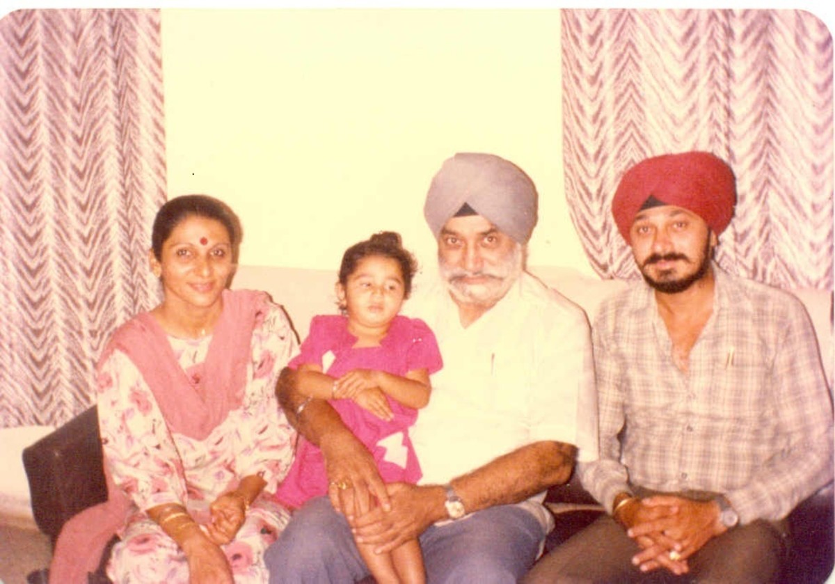 I with my dad, wife and daughter circa1989.