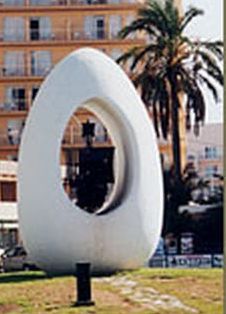 You can see the flattened bottom of the egg - Columbus cheated and broke his egg - also you might be able to see Columbus' ship in the hole in the middle.