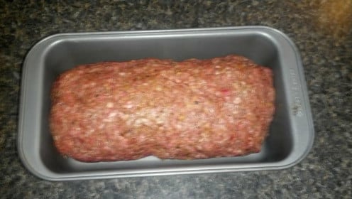 Here we have the stuffed meatloaf rolled and ready to put in the oven.