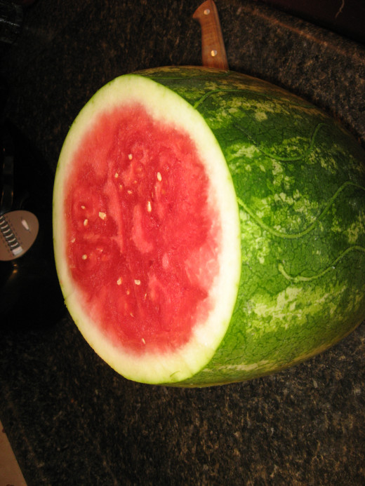 Remove top 1/4 of melon.