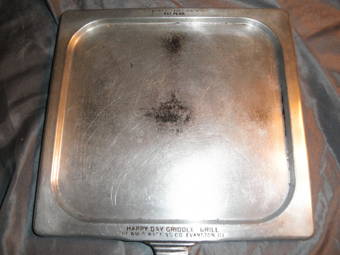 Happy day griddle grill face, which is generally pitted. It's tough to find them in excellent condition due to their age and use.