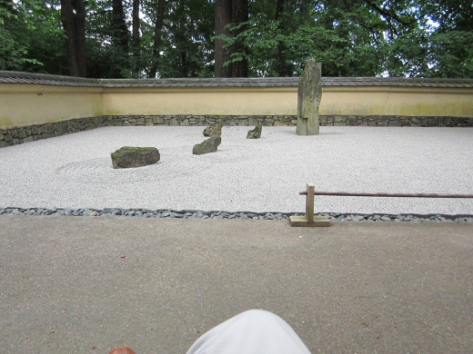 Zen Garden in the Portland Japanese Garden. My knee prominent in the foreground.