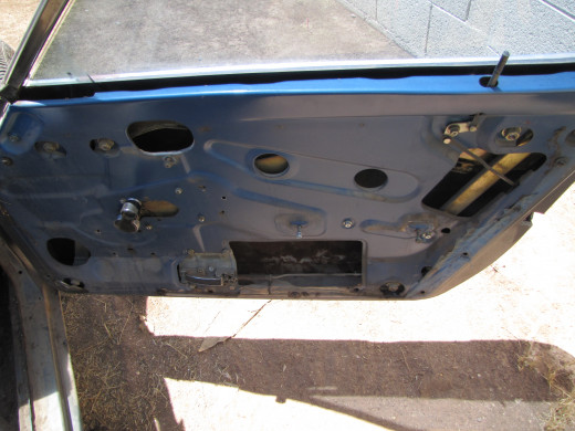 Aerial shot of the passenger side door after the removal of the door panel.