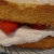 Add the second layer of the cake and frost. Add the second layer of the cake and frost.