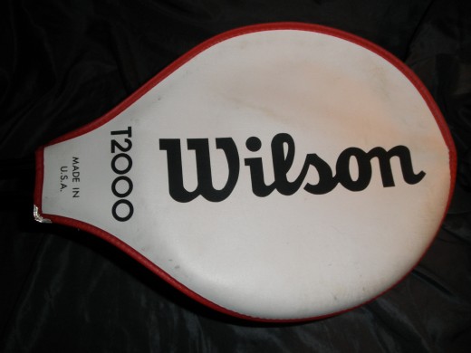 Here is the original Wilson T2000! This racquet is awesome and is very desirable to a wide range of tennis collectors because of its status symbol of the evolution of tennis equipment. These sell very well on Ebay