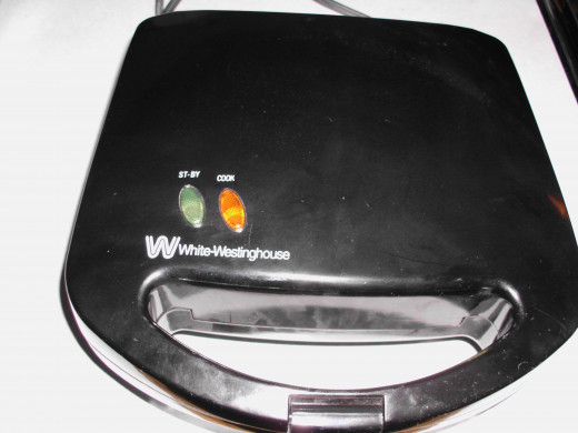 Electric Panini Maker. Heat up 5-10 minutes