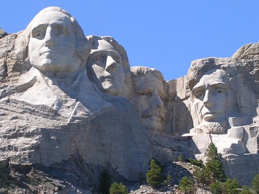 Mount Rushmore National Monument in the Black Hills of South Dakota. The four United States presidents carved in the granite rock are George Washington, Thomas Jefferson, Teddy Roosevelt, and Abraham Lincoln.