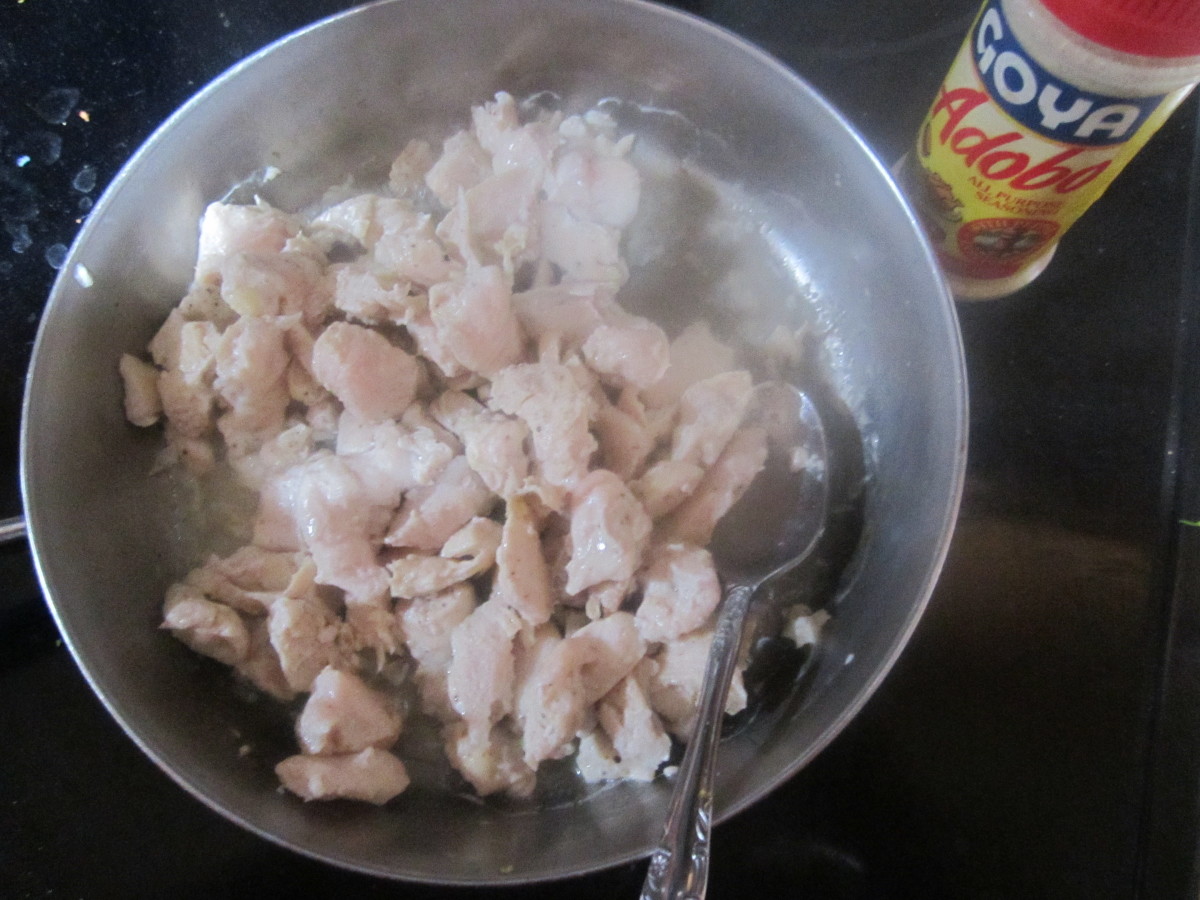 Cook chicken until done. I seasoned it with just a bit of Goya Adobe seasoning. Season as you see fit or skip seasoning.