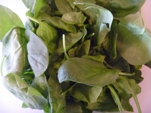 Raw spinach, washed and dried if needed.