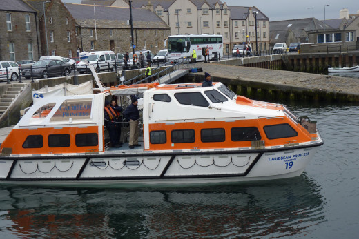 A Caribbean Princess tender in Kirkwall harbour (Orkney Islands, Scotland) in 2012. These tenders are covered.