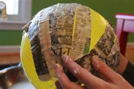 Putting the strips on the balloon