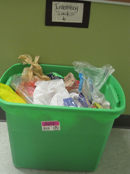 Caughey set up an art resource center - a series of tubs (green, of course), each marked with a different recycled art material.