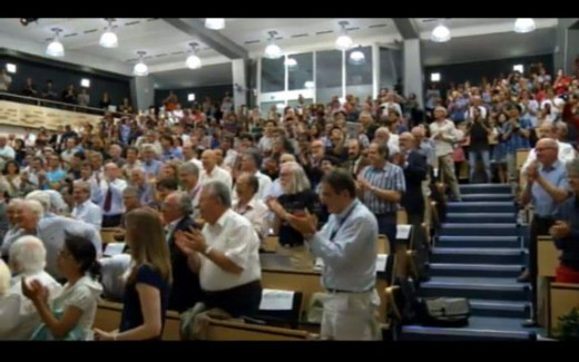 Physicists at the CERN lab in Switzerland applaud news of the discovery of a new particle, likely the Higgs boson, July 4, 2012.