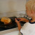 With close supervision, I allowed Alex to try his hand at flipping the sandwich. With close supervision, I allowed Alex to try his hand at flipping the sandwich.