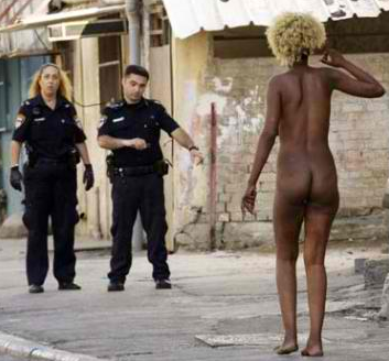Israeli Police Confront a Naked African