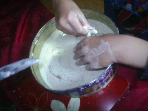 Feel the mixture with hands and add glitter