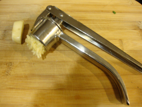 A garlic press makes things fast and super easy.