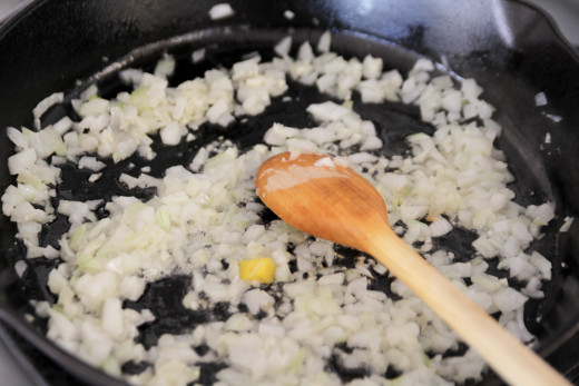 Sauteing onions in a frying pan