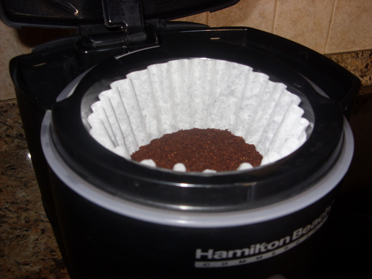 Step 4: Place coffee grounds into filter.