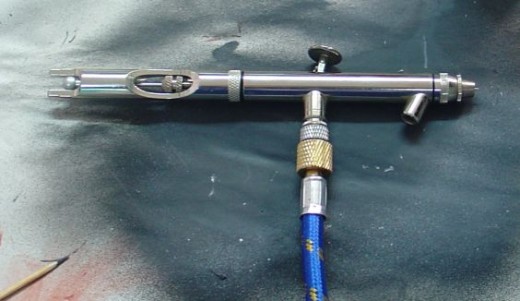 I may not know airbrushes, but I know how to research.  Research told me this is a good airbrush.