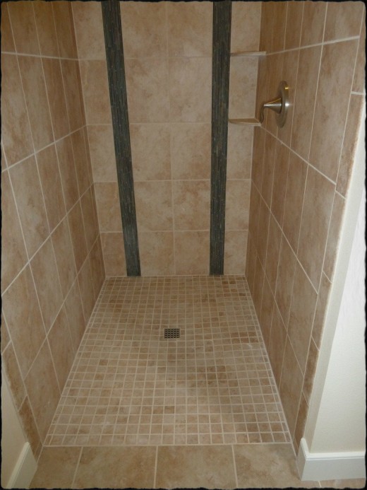 A walk-in shower minus the ledge prevents tripping.