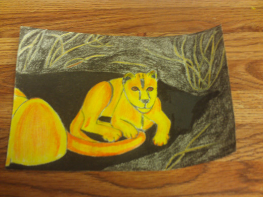 My drawing of a lion cub sitting beside his mom.
