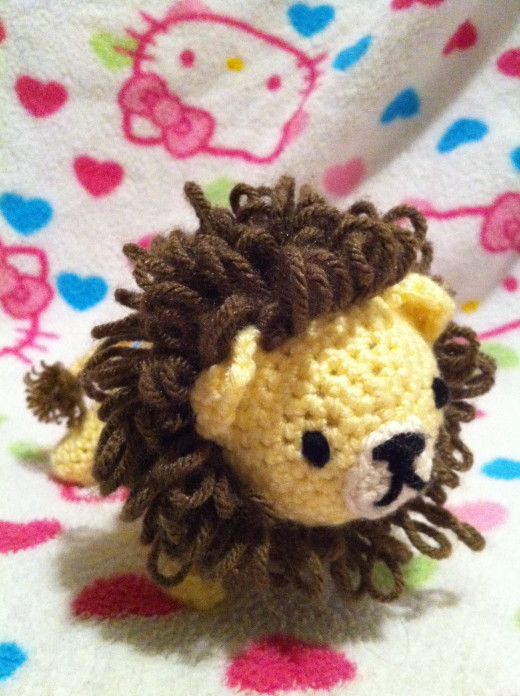 Crochet lion rattle