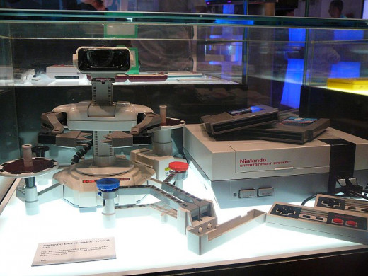 The first Nintendo home video game system sold in the United States, as displayed at the Nintendo World Store in New York City. The system included a Nintendo Entertainment System Control Deck, two NES Controllers, a R.O.B. (Robotic Operating Buddy),