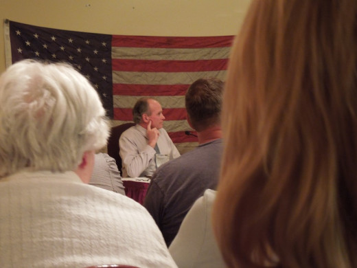 The one person whose face you see here is Jim Patterson, current chair of the San Luis Obispo County Board of Supervisors. He was voted out in June. This is one of the campaign events -- a discussion forum.