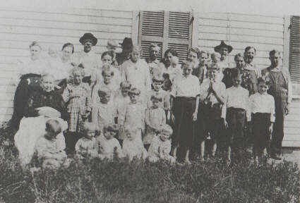 The family that Hattie and John Henry raised with help from Alice's mother, Sallie (front left seated)