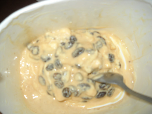 Drunken raisins mixed into softened vanilla ice cream.