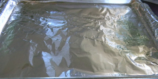 Line cookie sheet with foil