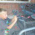 Inserting quarter to get grocery cart at Aldi Inserting quarter to get grocery cart at Aldi