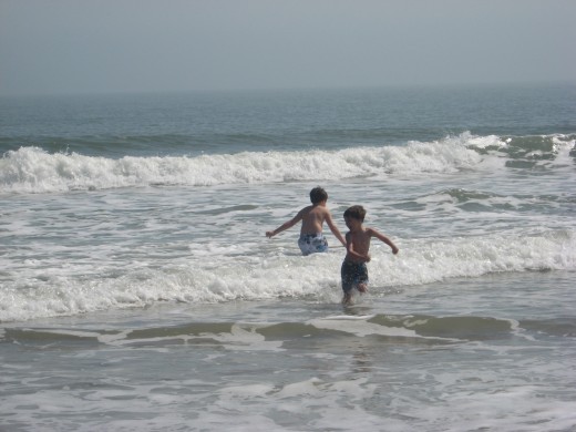 Jonathan and Tristan navigate the waves.