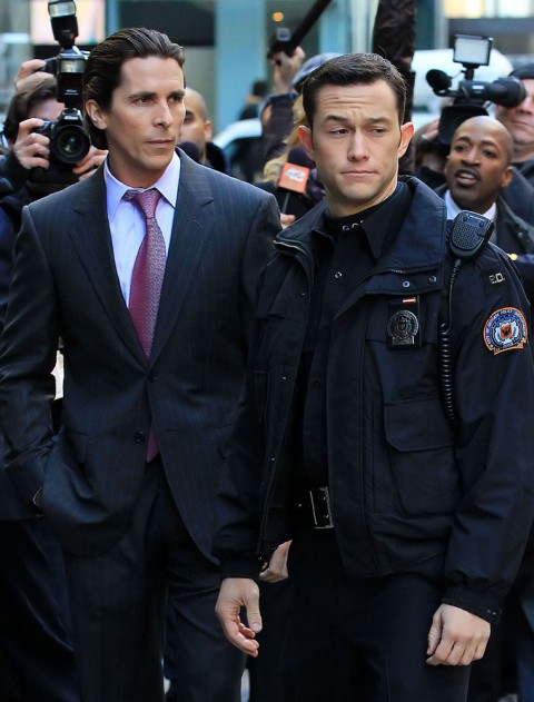 Christian Bale as Bruce Wayne and Joseph Gordon Levitt as Blake
