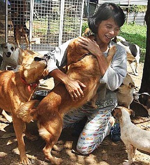 Sabrina with her dogs at the shelter