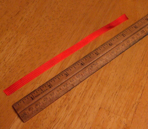 I cut an 8 inch length of ribbon.
