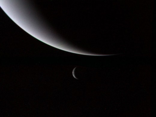 Neptune and Triton, the largest captured moon in the solar system.