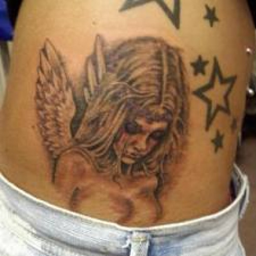 tattoos angel symbol and meanings And Cherub Meanings Tattoo Tattoos And Cherub Designs