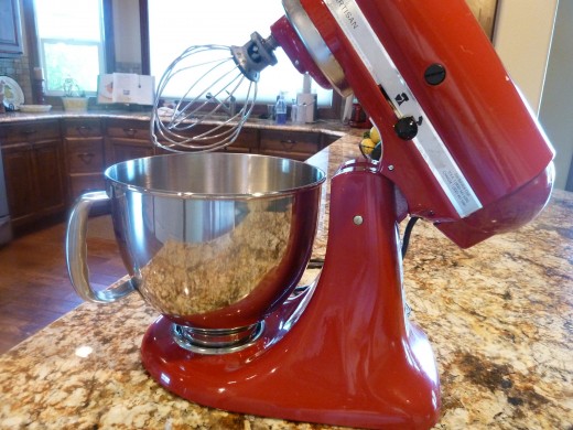 KitchenAid Artisan Stand Mixer in red.